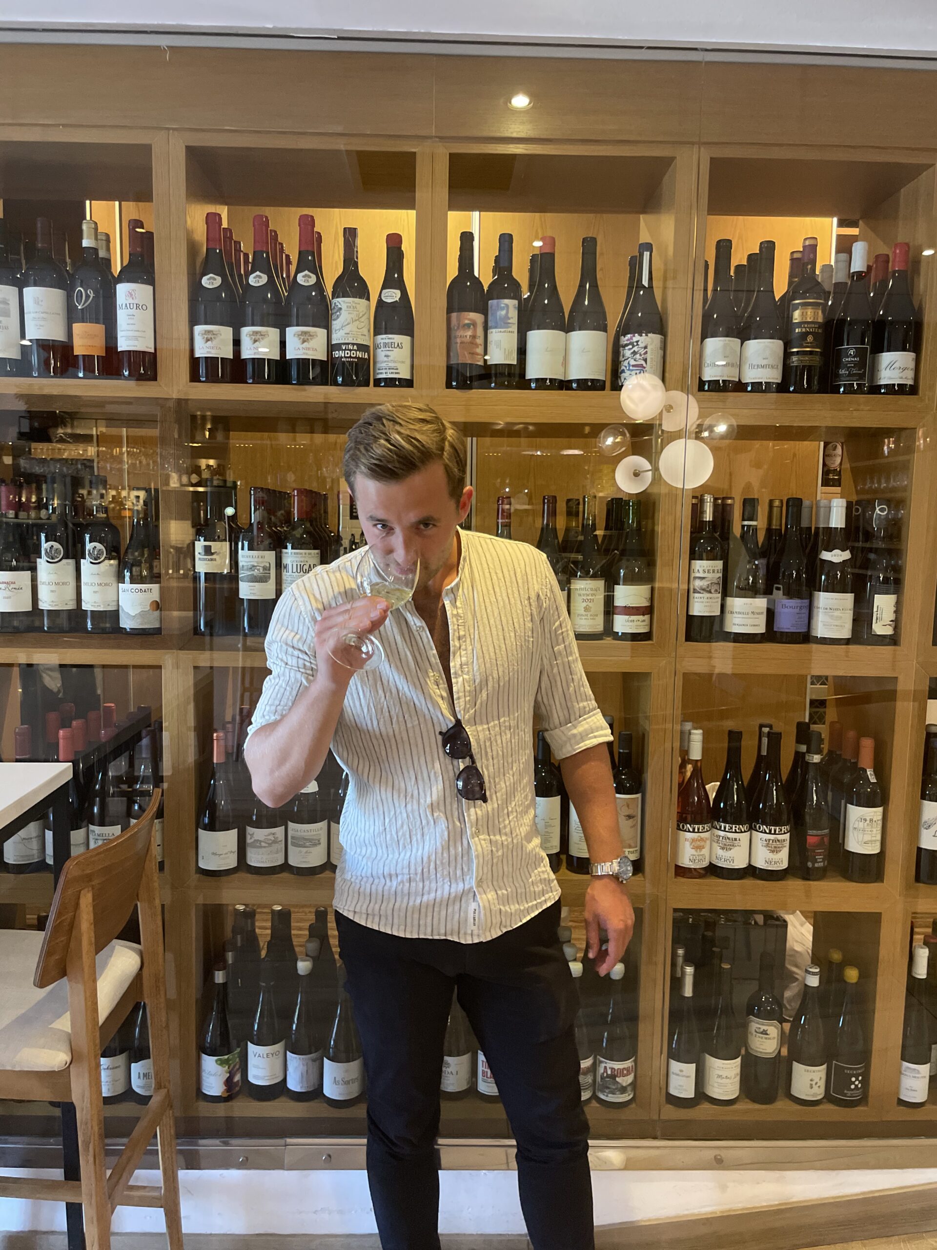 Sommelier Tristan choosing wines